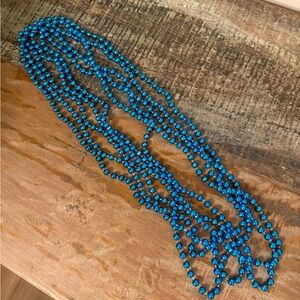 5 Blue bead necklaces. New. Great for Mardi Gras, boy baby shower, etc.